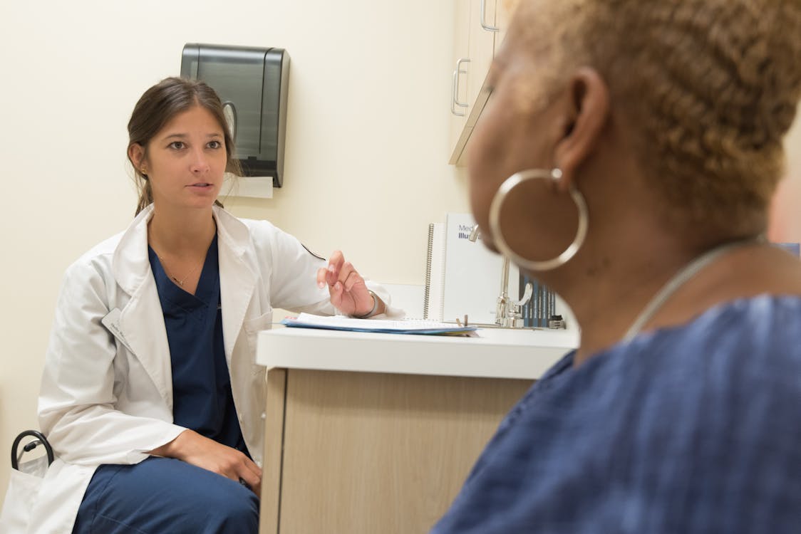 Patient receiving medical consultation about stem cell therapy options